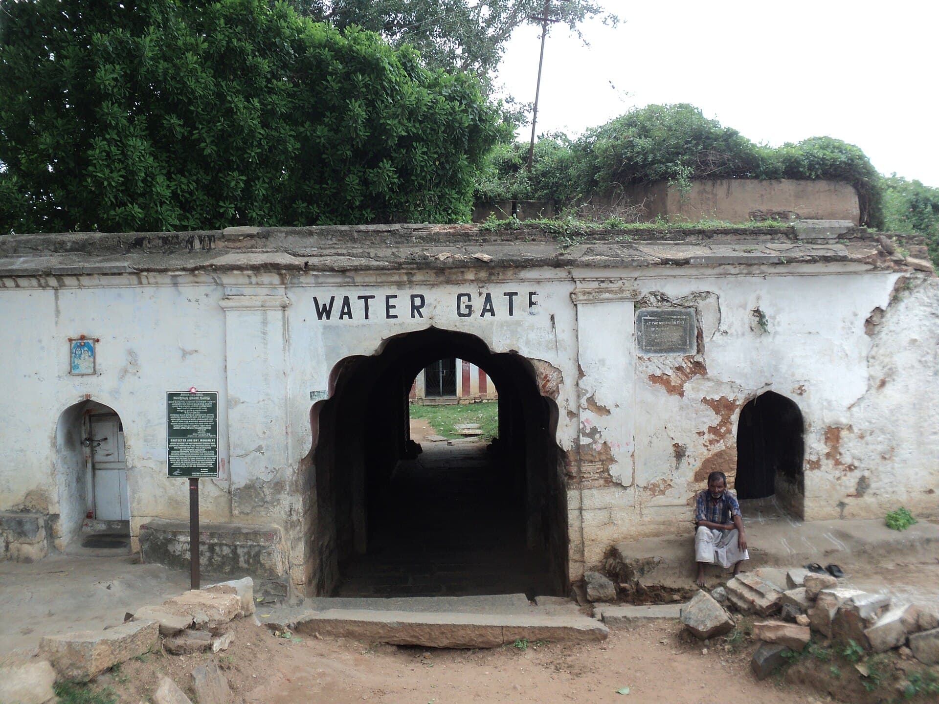 The stone archway of the Water Gate at Srirangapatna as it stands today, cut through the thickness of the rampart.